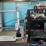 3D Printers Sparkx i7 on the left, Ender 3 on the right